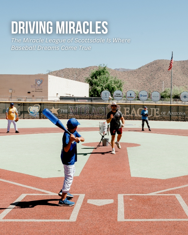 Young baseball players practicing on a red turf baseball field at Dan Haren Field, with kids in action and a scoreboard in the background. Featured in Scottsdale Lifestyle Magazine.
